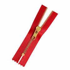 A metal zipper with brass teeth and slider on red tape, partly open