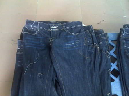 Figure 1.14 Finished jeans with whiskers.