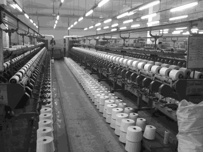 fiber feeding through winding in a modern spinning mill.