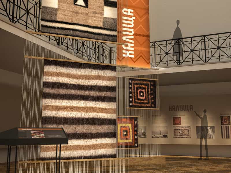 museum exhibit showcasing traditional carpets